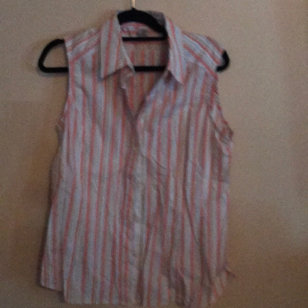 Women’s sleeveless top with buttons.